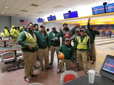 Greenscape landscaping employees enjoying company bowling party